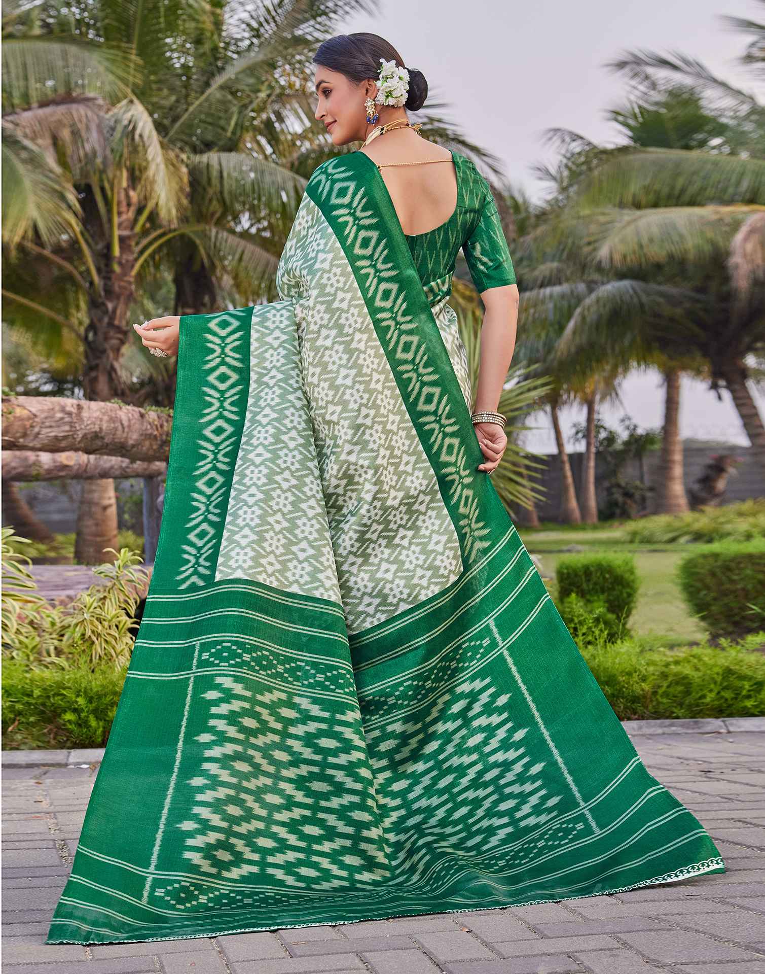 Green Cotton Blend Ikkat Printed Saree - Image 8