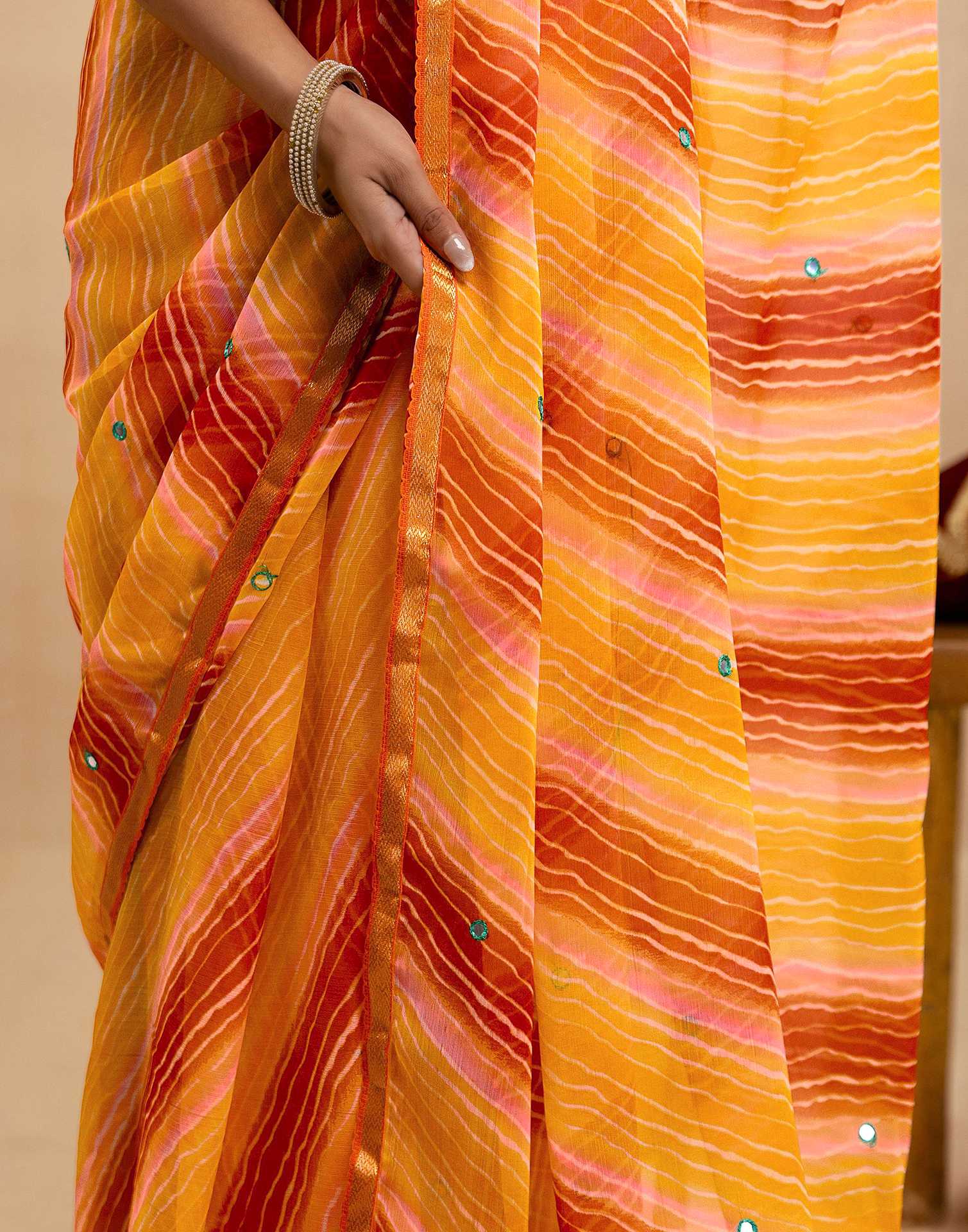 Orange Chiffon Mirror Work Laheria Printed Saree - Image 12