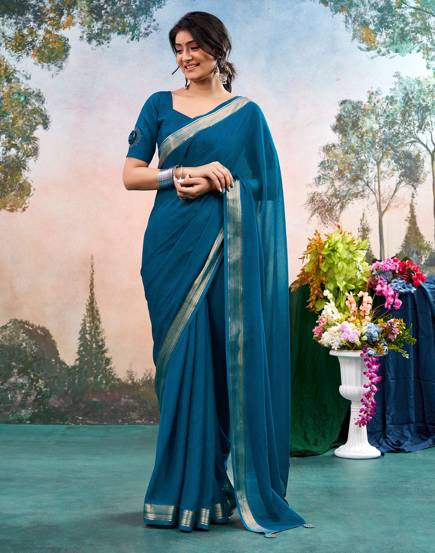 Peacock Blue Chiffon Woven Border Saree