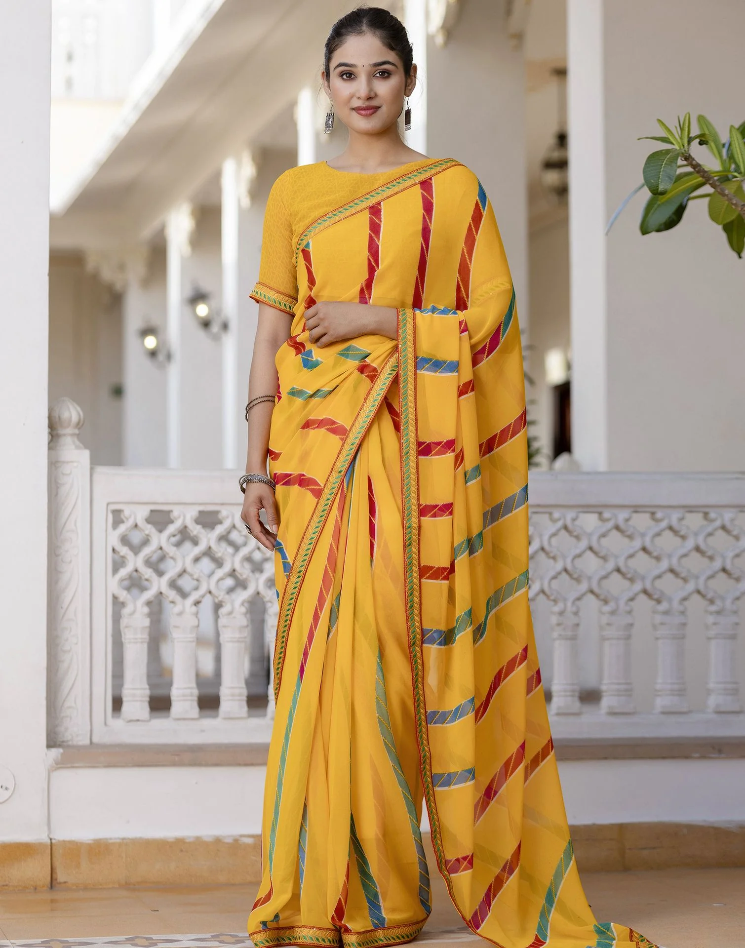 Yellow Georgette printed Saree